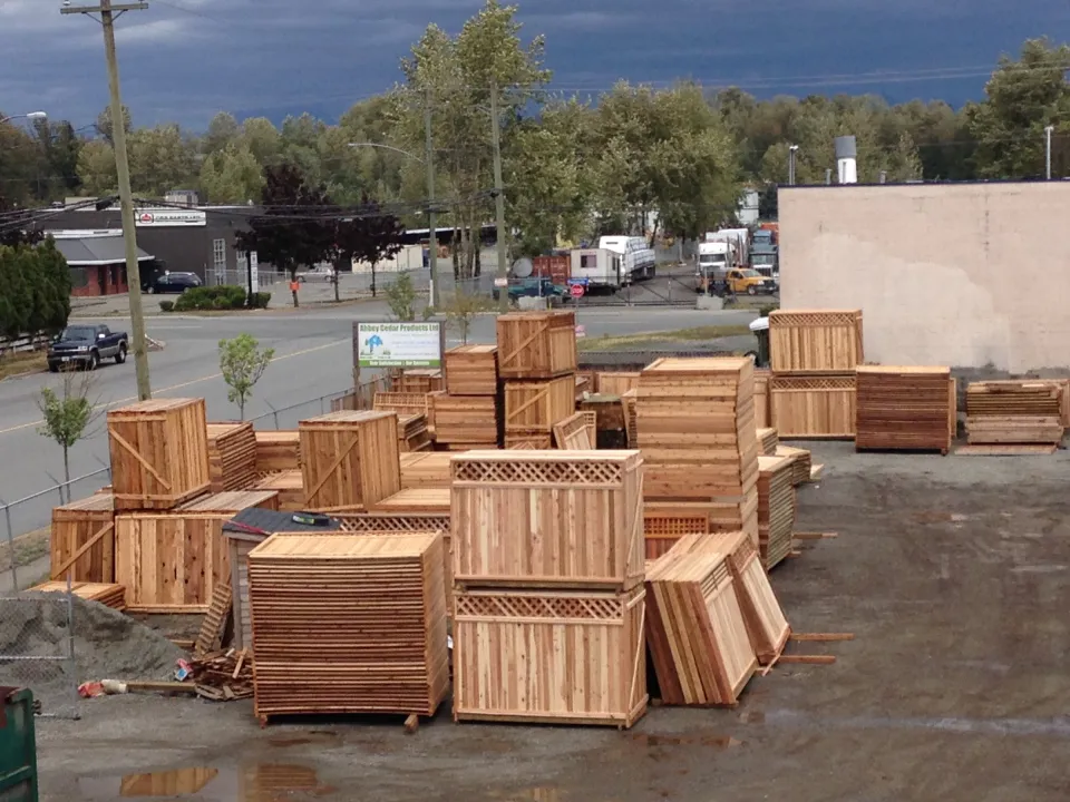 Stacks of finished cedar fence panels at Abbey Cedar Products on Peardonville Road, Abbotsford